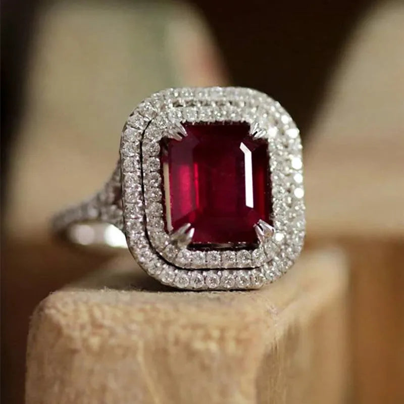 Women's copper geometric ring with square princess cut red rhinestones showing size options 6 through 10