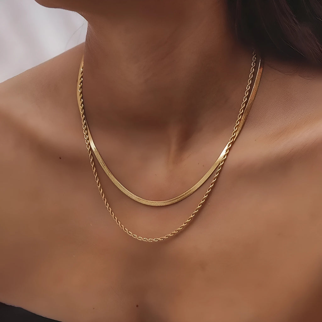 Retro double-layer twist necklace with geometric pendant on a silver snake bone chain.