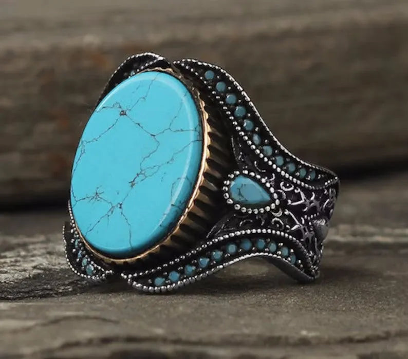 Men's round turquoise antique silver alloy ring showing simple band design