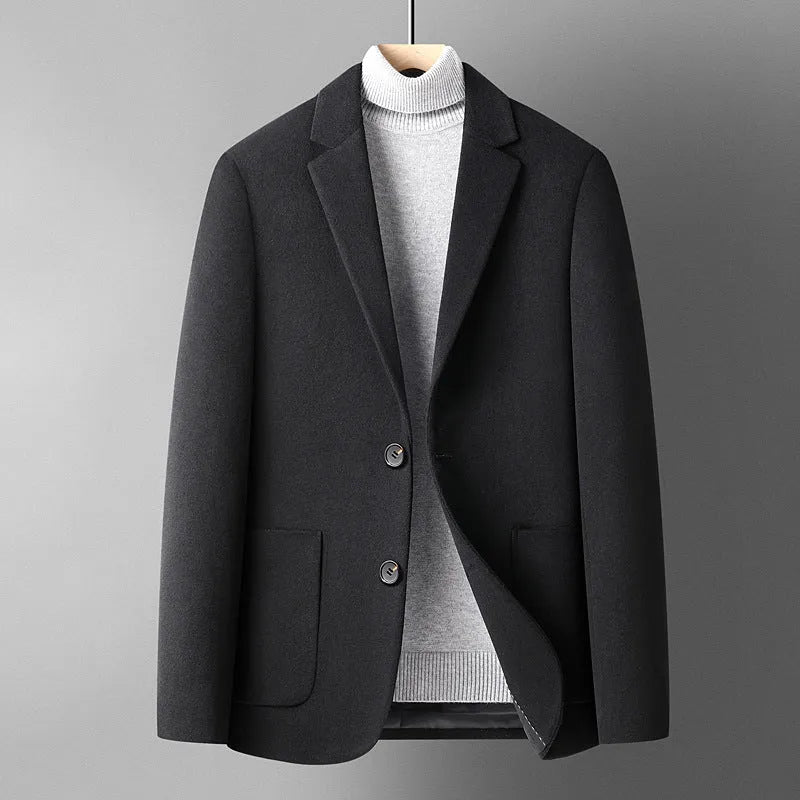 Men's grey slim fit wool blend suit jacket with notch lapel, shown on a model.