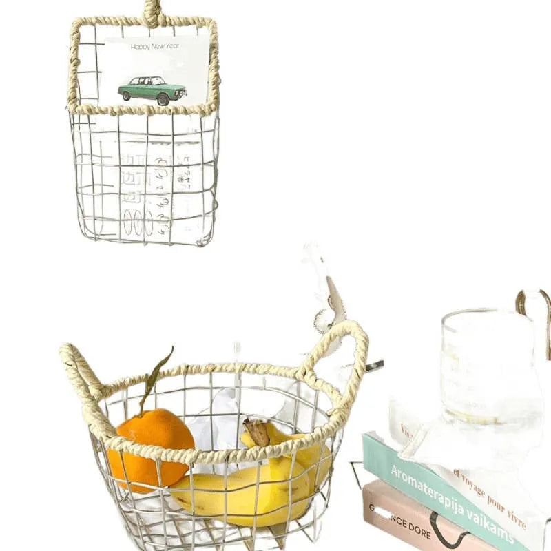 Nordic iron wire woven storage basket in binaural woven style, small size, containing fruit on a kitchen countertop