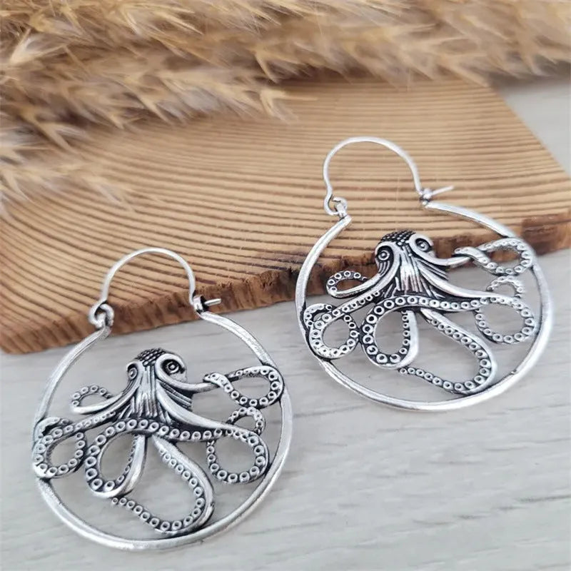 Vintage antique silver octopus earrings with electroplated finish and animal zodiac modelling
