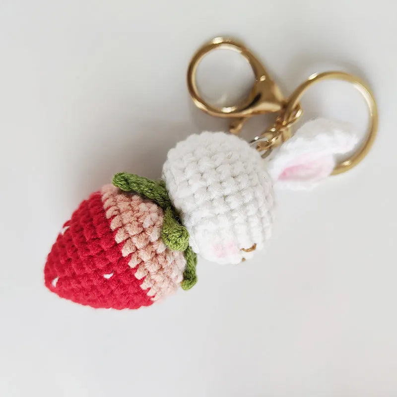 Hand-woven colourful doll wire pendant shaped as a rabbit with a strawberry design, featuring a key loop.