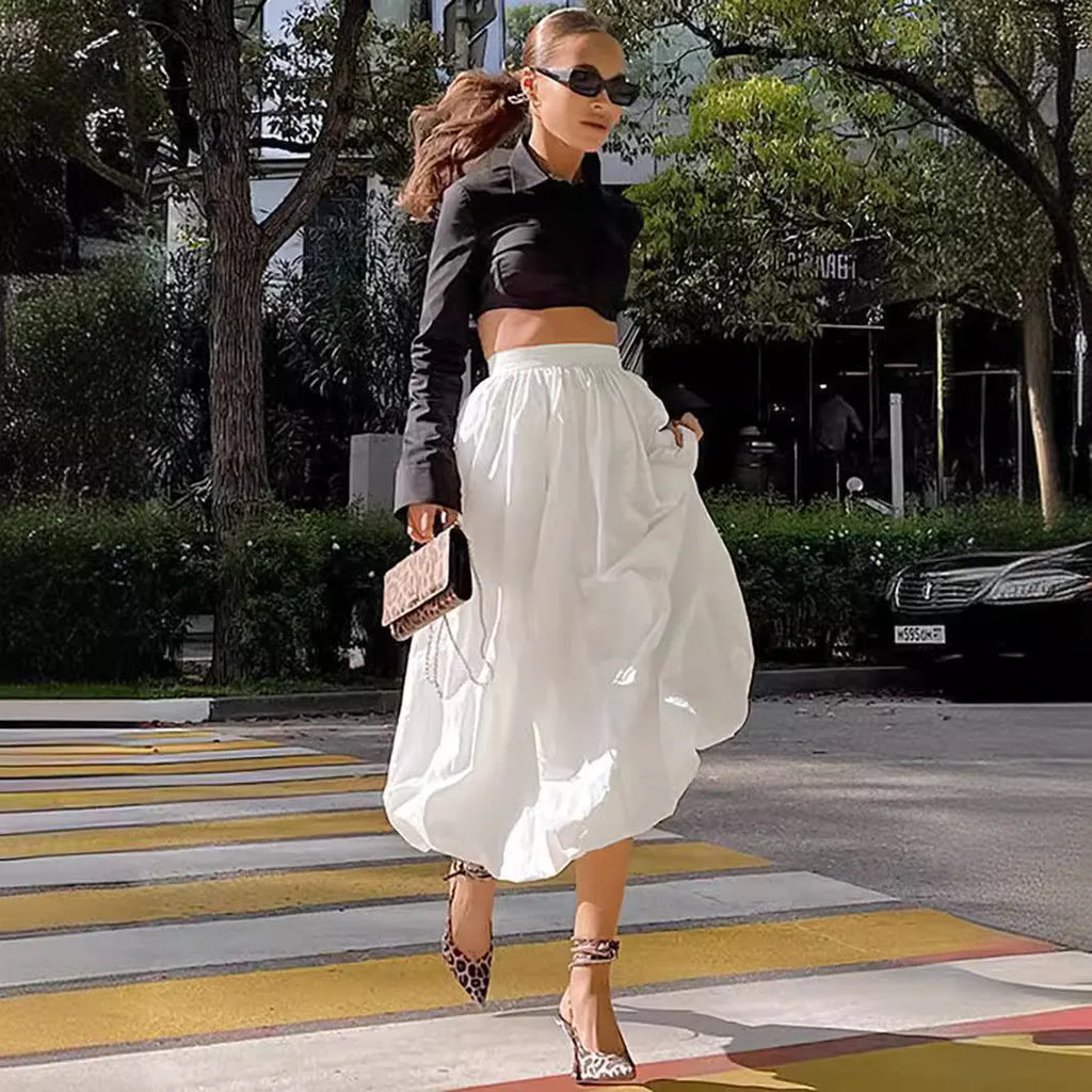 Women's solid colour long cotton skirt with elastic waistband in black or white