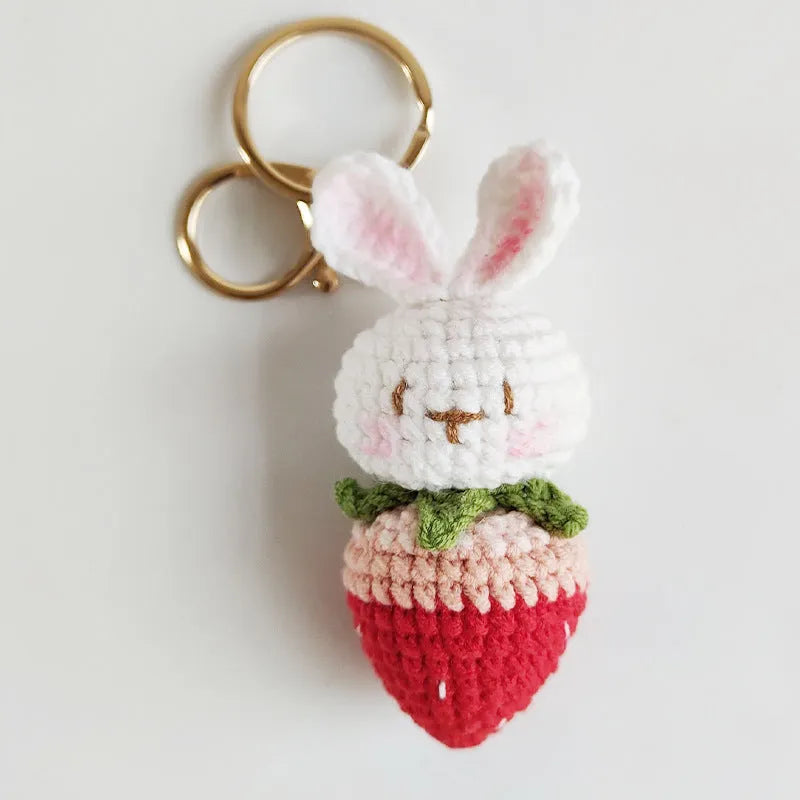 Hand-woven colourful doll wire pendant shaped as a rabbit with a strawberry design, featuring a key loop.