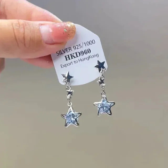 Geometric women's ear clip earrings with rhinestones, heart motifs, star accents, and dangling tassels on alloy with electroplated finish