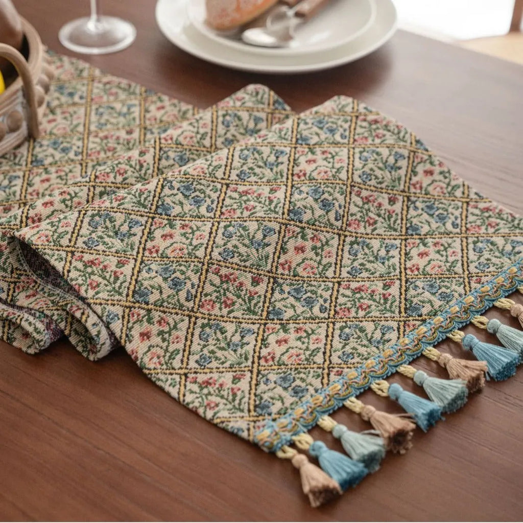 Nordic jacquard stripe pattern table runner with tassel fringe in dark blue.