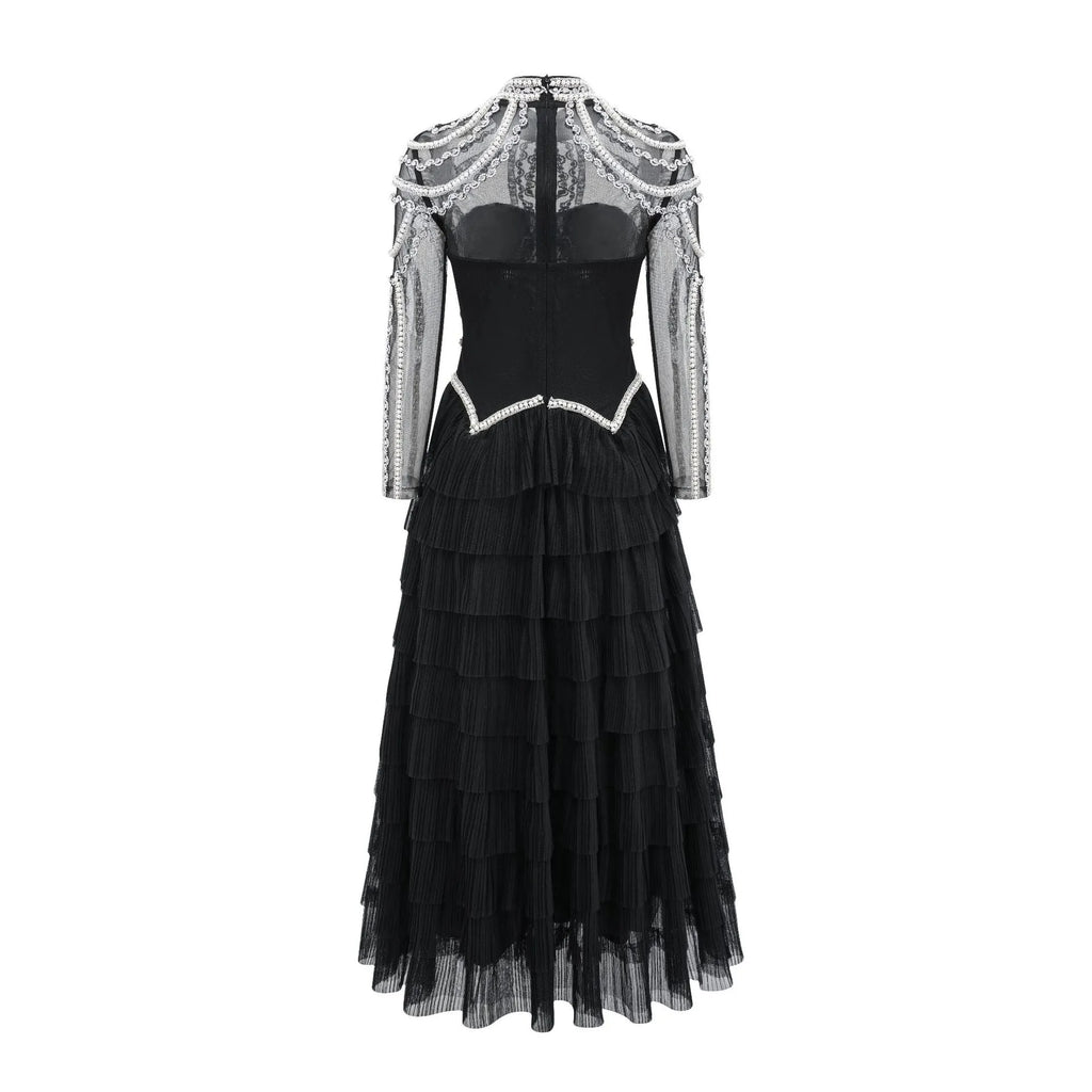 Women's black beaded long sleeve formal dress with floor-length skirt