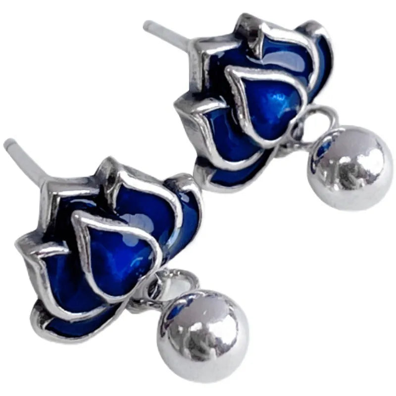Blue lotus earrings with retro seedpod tassel design and flower shape measuring 1.2cm wide