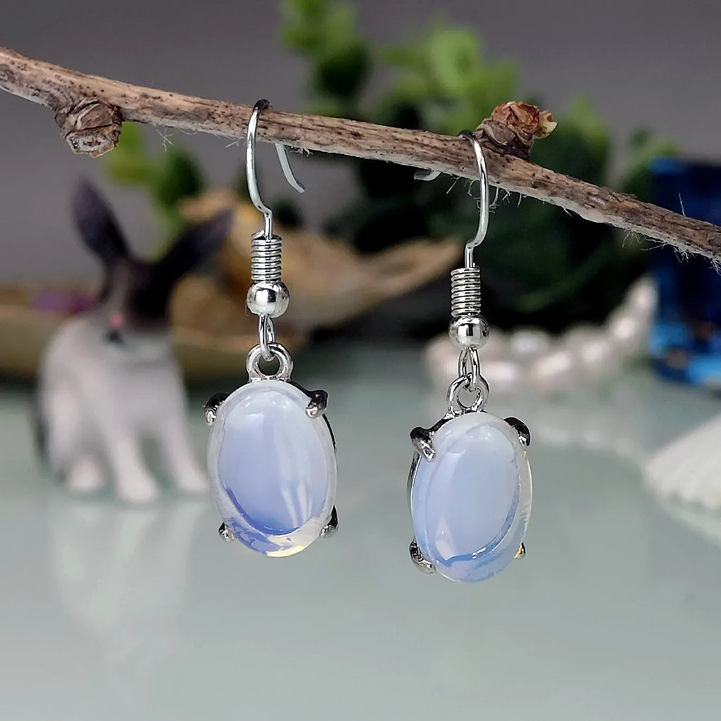 Moonlight white opal earrings with cross pendant in retro drop shape design