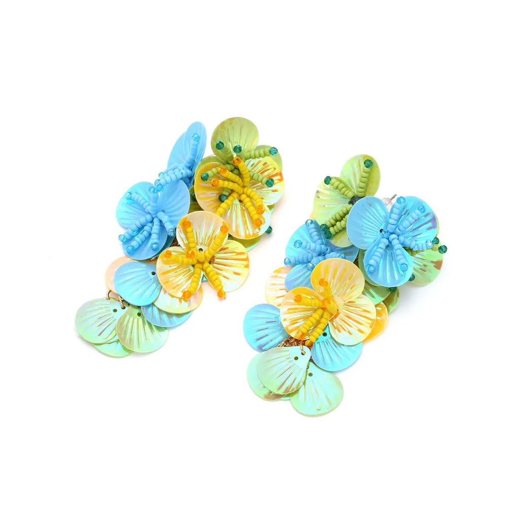 Handmade string bead flower earrings with exaggerated floral design in colourful, rose, or purple options