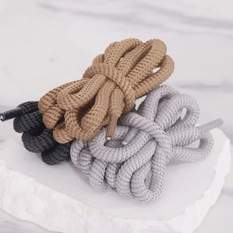 Oval shoelace adapter ropes in multiple colours on a white background, showing the round style.