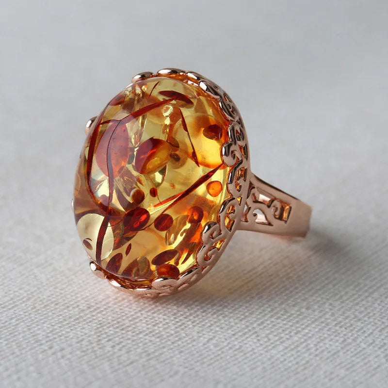 Beeswax amber ring with New Amber Type A stone on an alloy band, ethnic retro style.