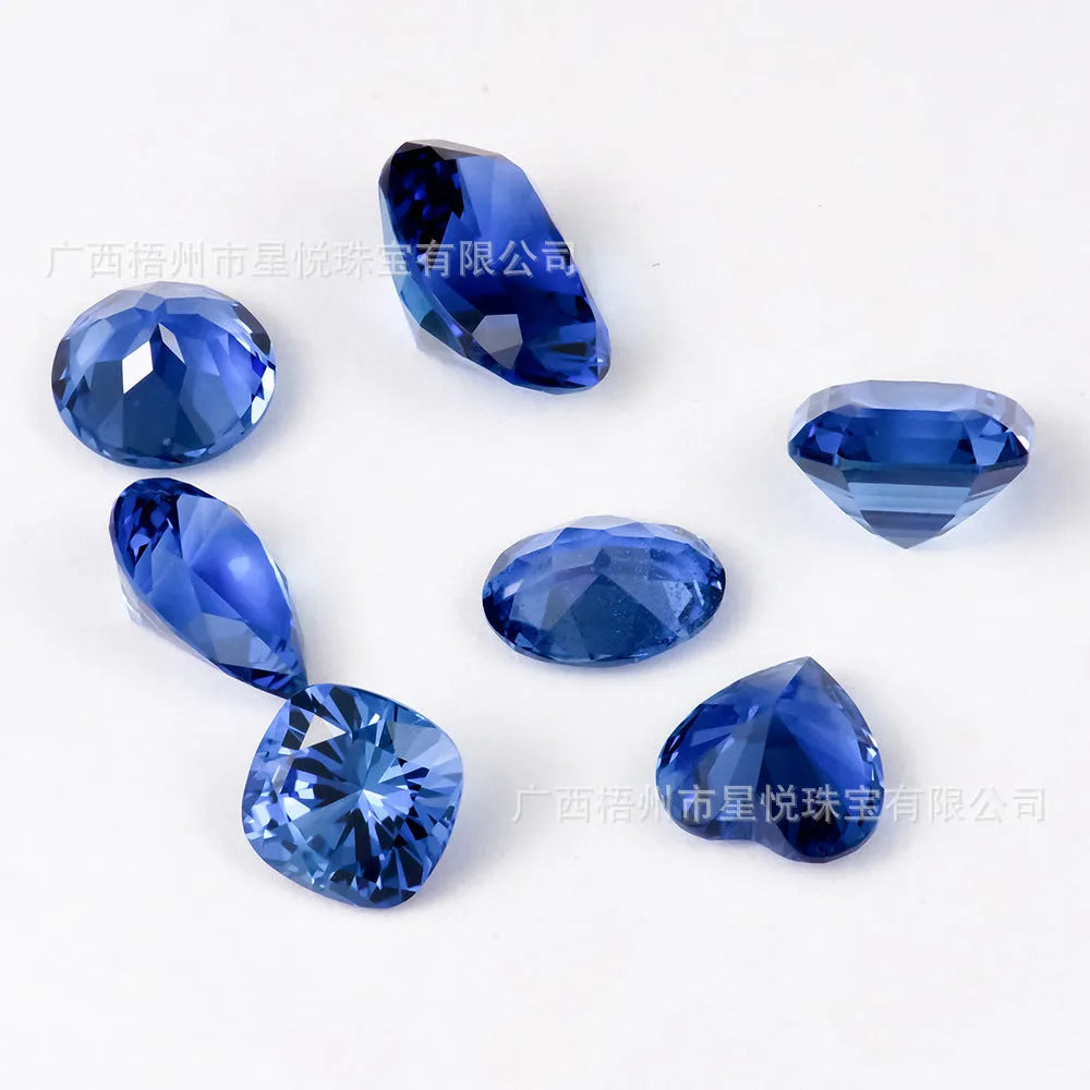 Royal blue heart-shaped tiara cut cubic zirconia loose gemstone on white background