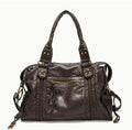 Women's brown soft PU leather retro messenger bag with a single shoulder strap, shown open to reveal internal zippered organisers.