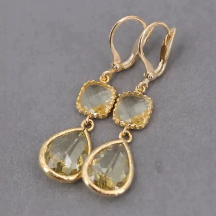 Gold geometric long fringe earrings with water droplet crystals on copper