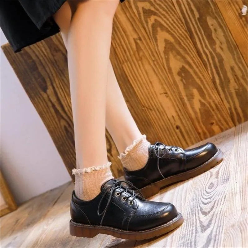 Women's black preppy Mary Jane low-heel pumps with round toe and front lace-up design