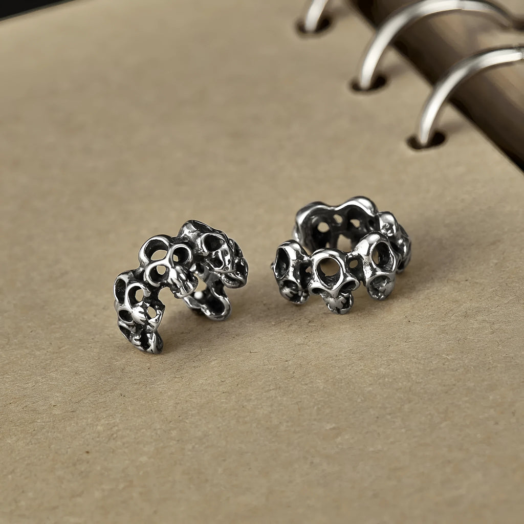 Stainless steel hollow skull ear clip earrings with geometric retro design