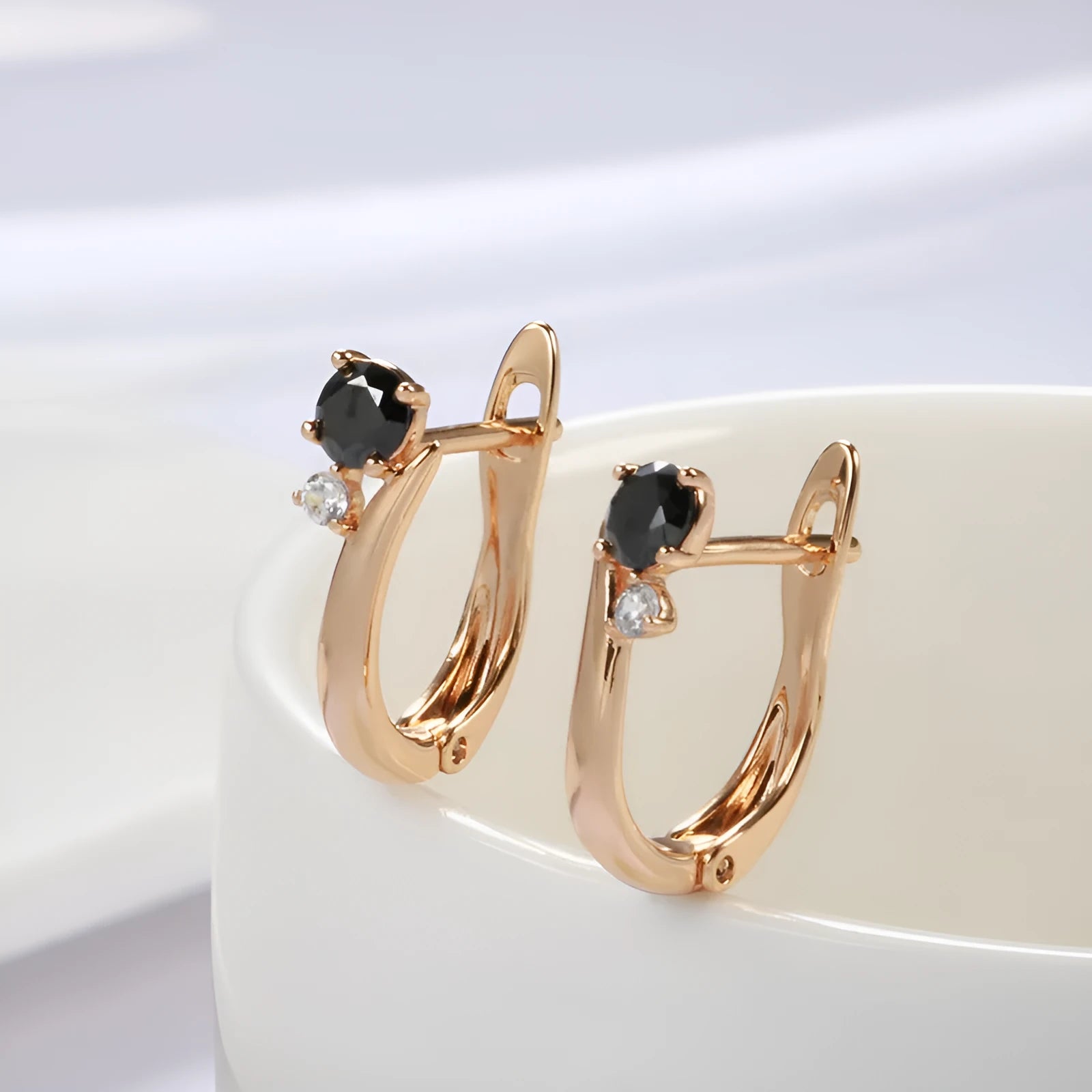 Gold women's earrings with black agate stone, geometric retro design in drop shape