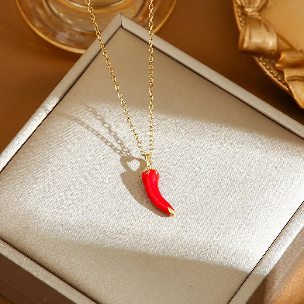 Women's delicate titanium steel necklace with a small cherry charm pendant on an O-ring chain.