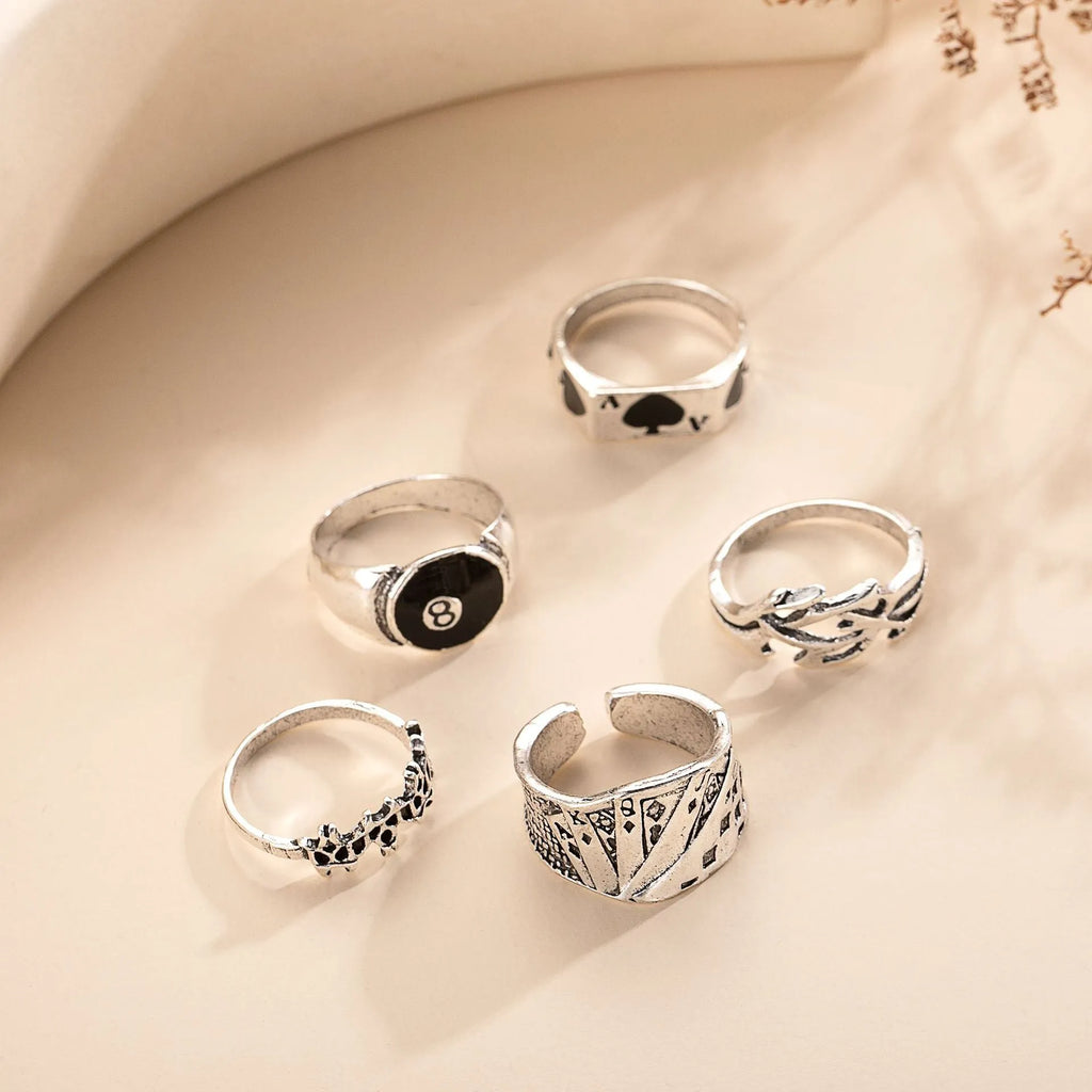 Black alloy poker spade ring with adjustable sizing for women