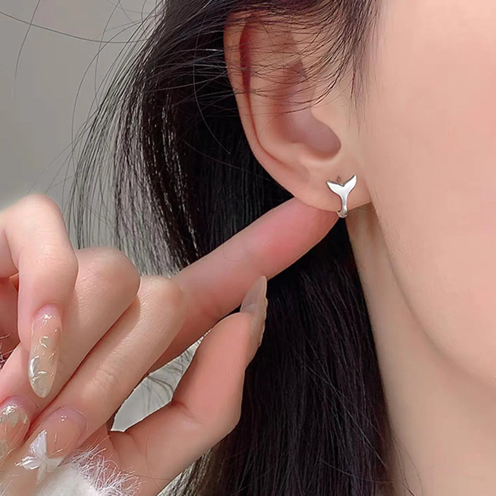 Women's fashion fishtail earrings in electroplated copper with white gold or yellow gold colour options