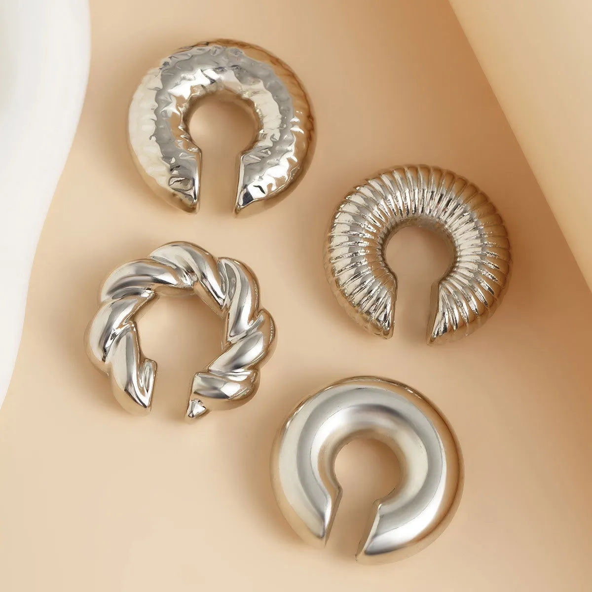 Geometric clip-on earrings for women in gold and silver colours, four-piece set