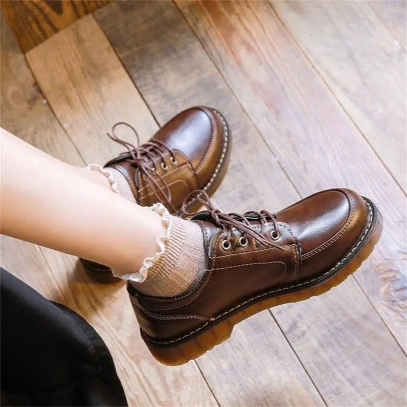 Women's black preppy Mary Jane low-heel pumps with round toe and front lace-up design