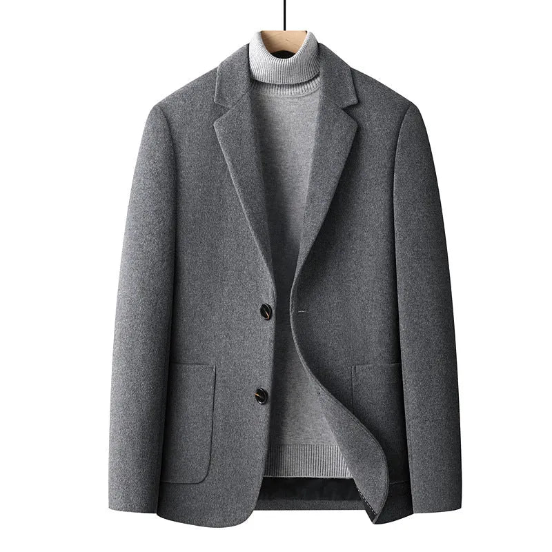 Men's grey slim fit wool blend suit jacket with notch lapel, shown on a model.