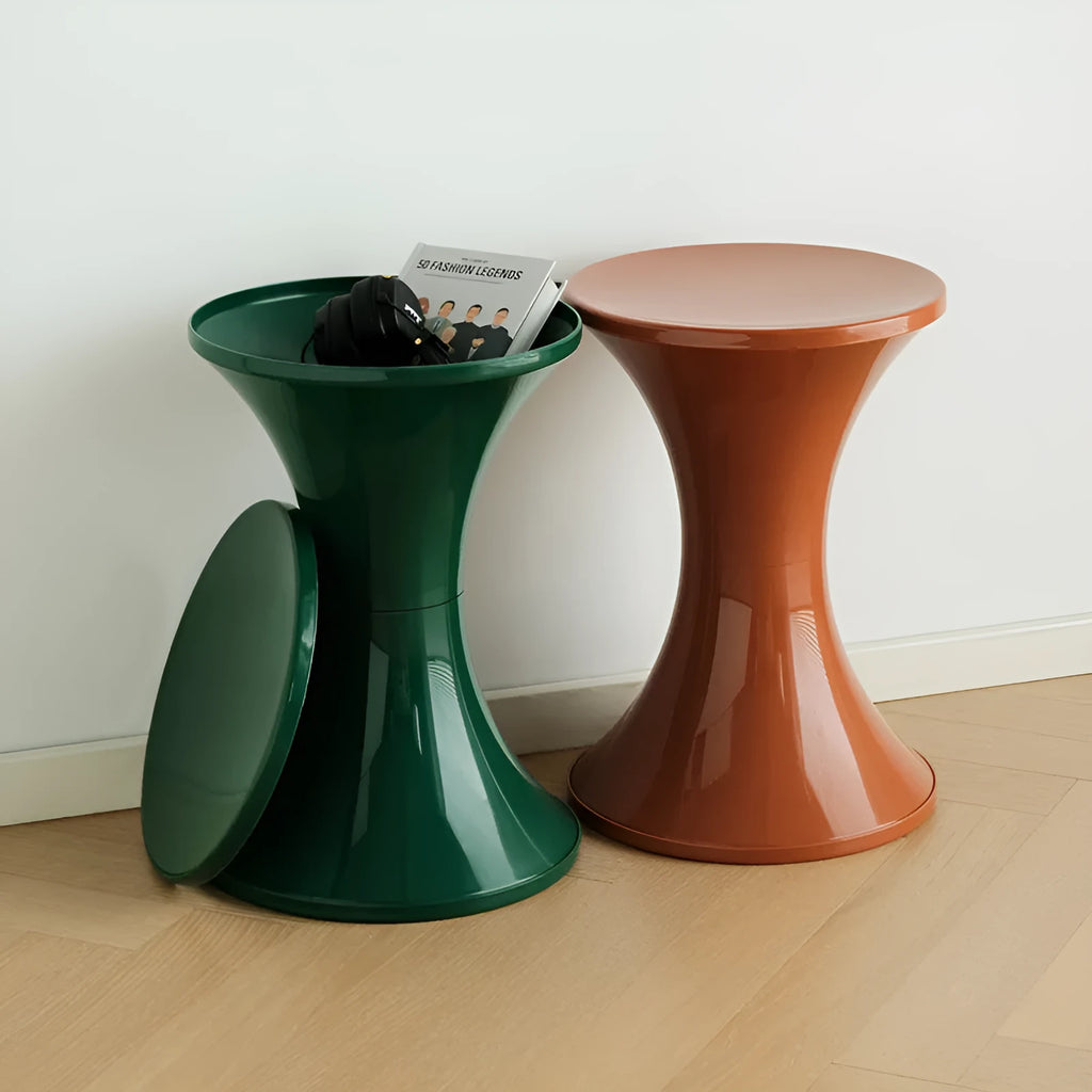 Hourglass-shaped plastic shoe changing stool in a choice of five colours: black, green, red, white, brown.