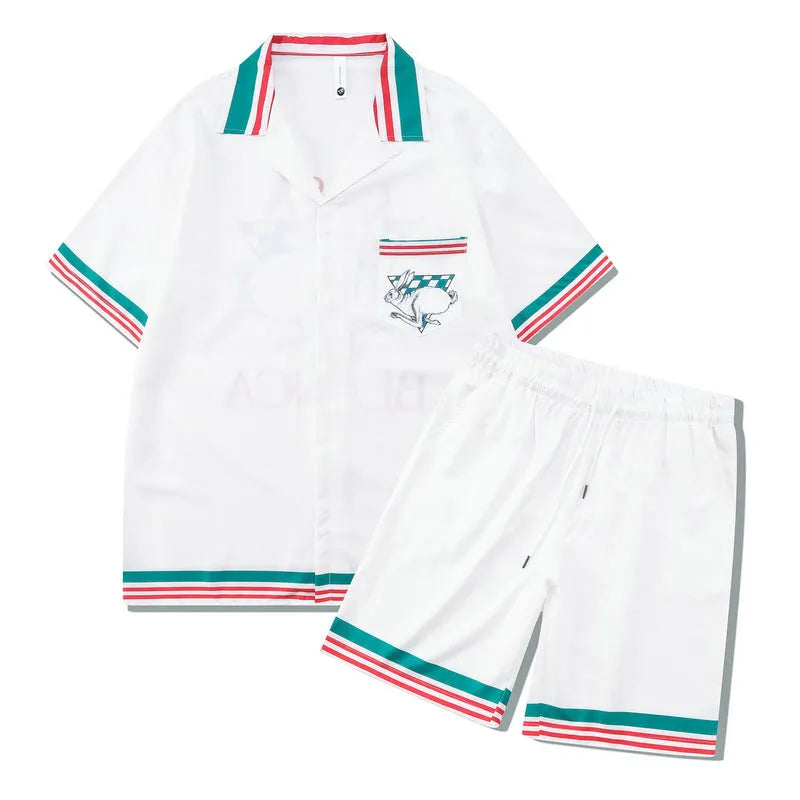 Men's plaid print polyester beach outfit consisting of a short-sleeve shirt and matching trousers.