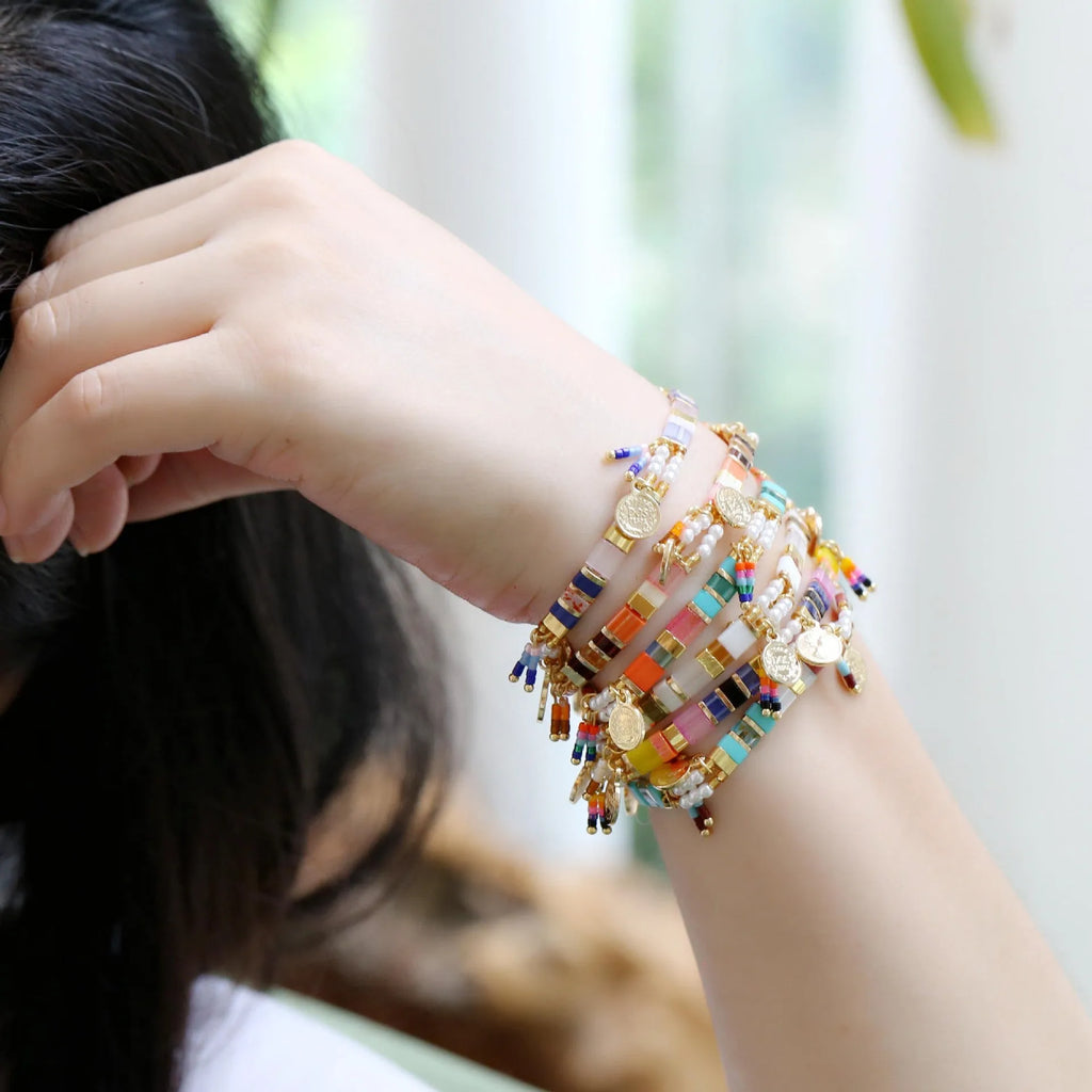 Women's handmade bracelet with imitation pearls and coloured glass beads in original design