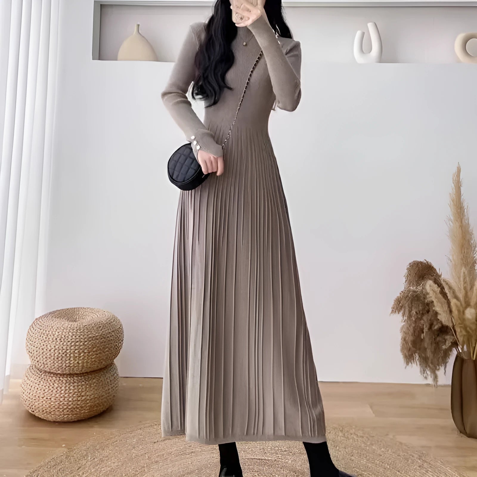 Women's high-waist A-line midi knit skirt in a wool-blend fabric, shown in a solid colour.