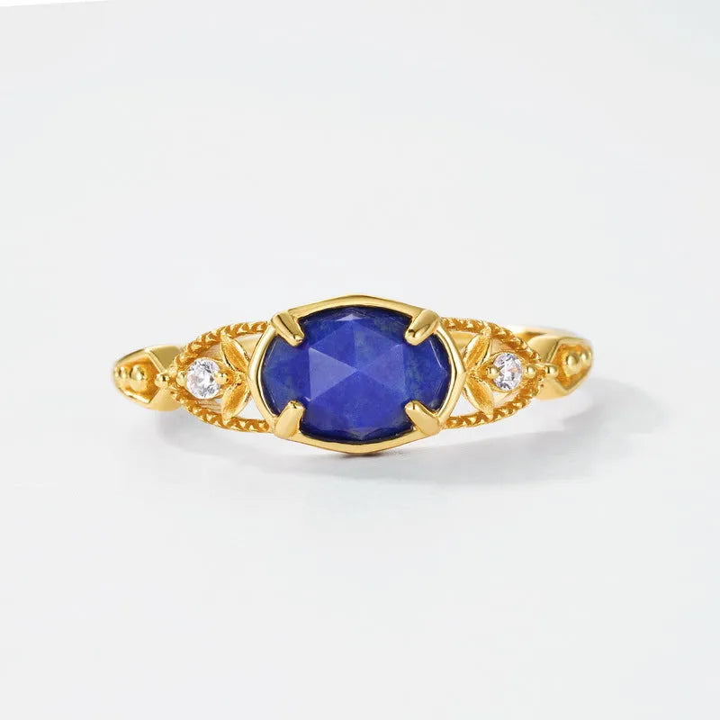 Lapis lazuli ring with geometric silver setting showing forest night sky colour stone