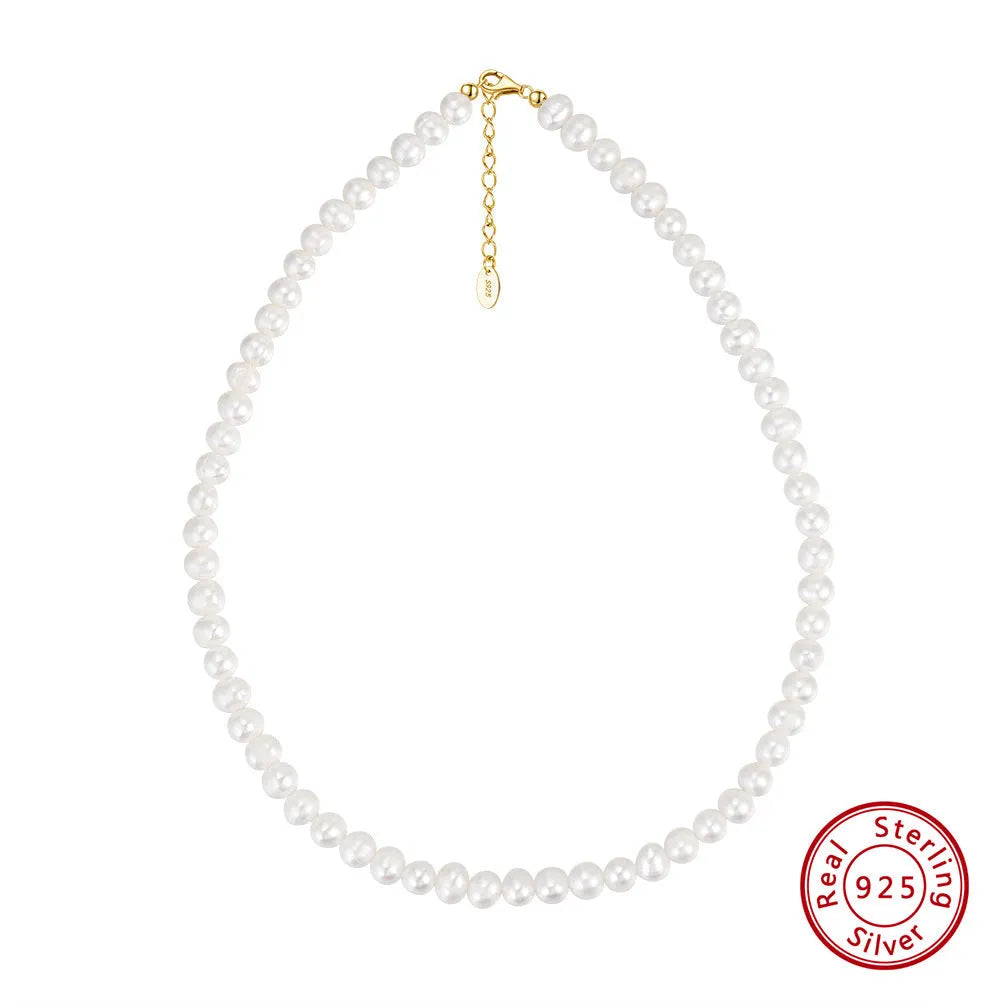 Silver adjustable necklace with freshwater pearl pendant on display
