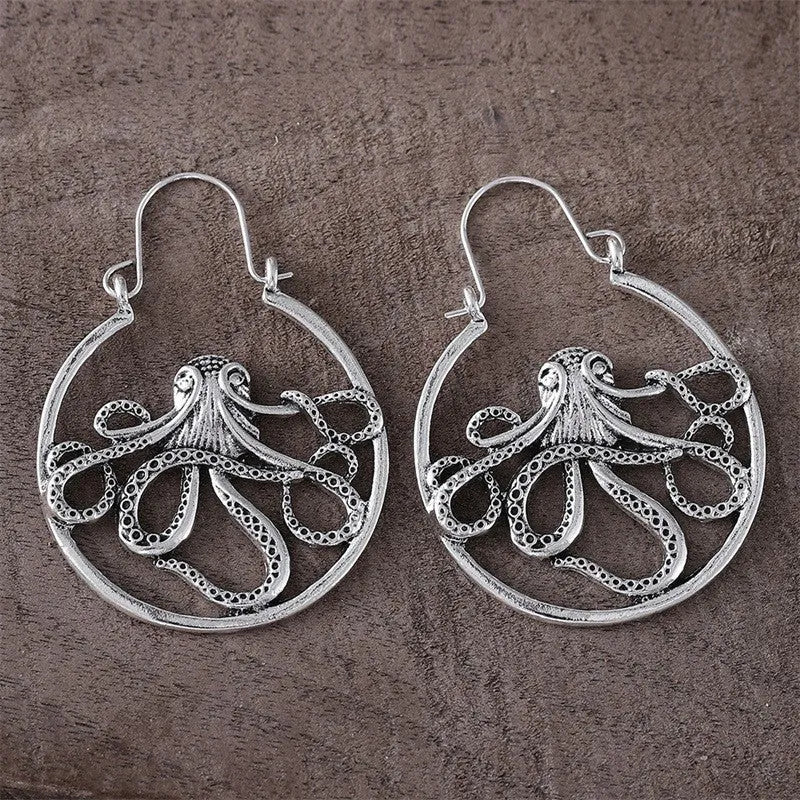 Vintage antique silver octopus earrings with electroplated finish and animal zodiac modelling