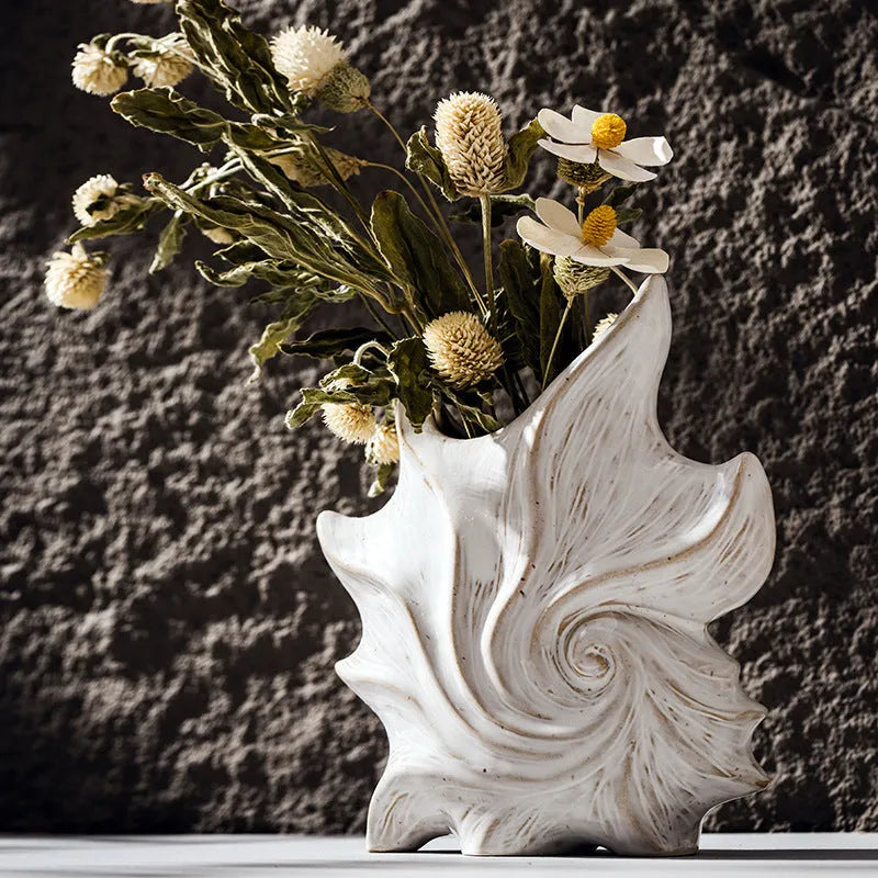 French art ceramic vase with coloured glaze retro finish on a table