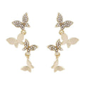 Women's copper butterfly drop earrings with gold-coloured four-butterfly design
