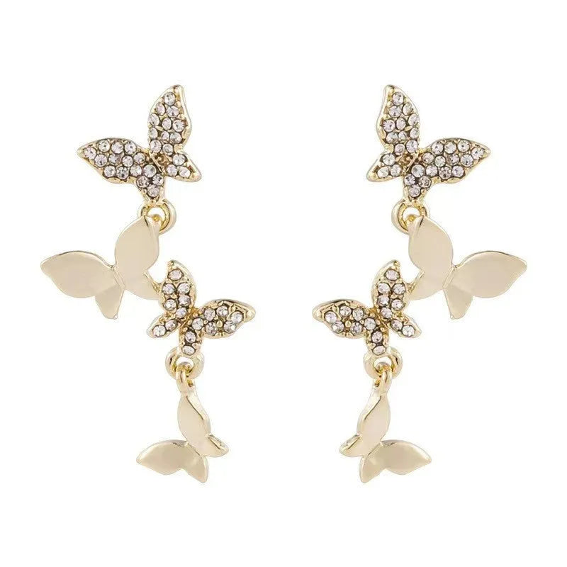 Women's copper butterfly drop earrings with gold-coloured four-butterfly design