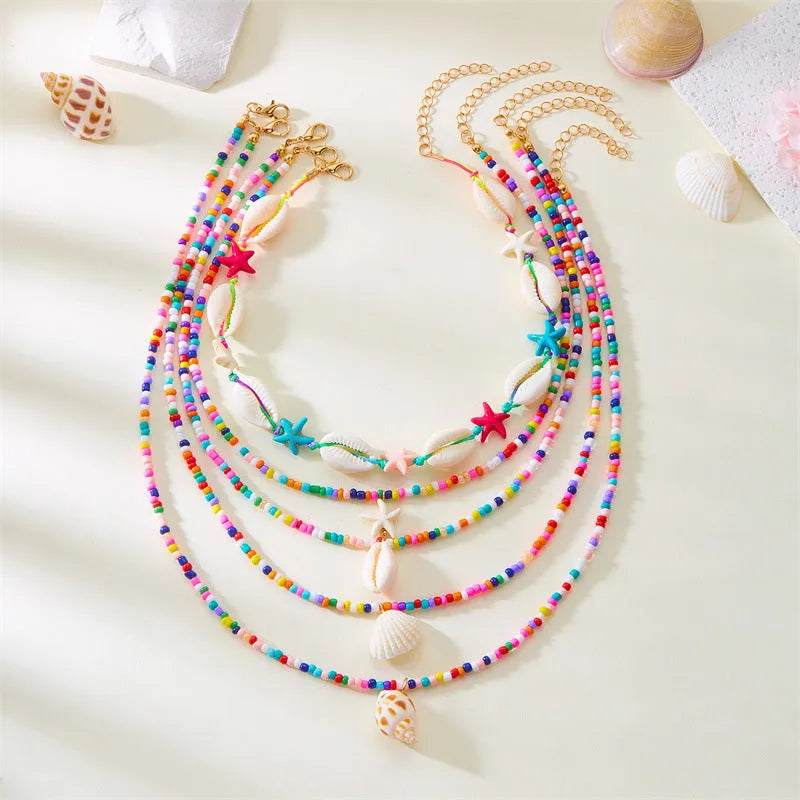 Women's starfish shell conch bead necklace five-piece set with blue and colourful electroplated alloy pendants