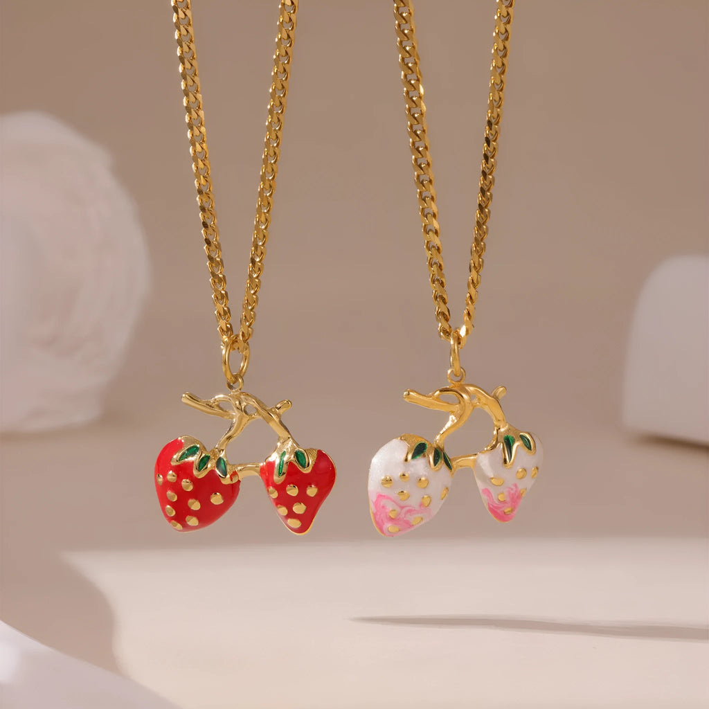 Stainless steel strawberry fruit pendant necklace in red and white gradient colour options.