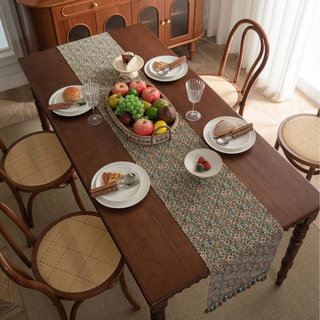 Nordic jacquard stripe pattern table runner with tassel fringe in dark blue.