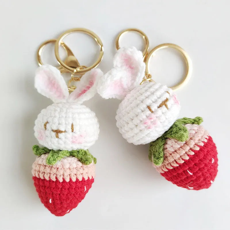 Hand-woven colourful doll wire pendant shaped as a rabbit with a strawberry design, featuring a key loop.