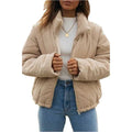 Women's apricot coloured corduroy jacket with a stand collar and front zipper on a hanger.