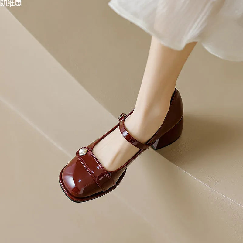 Women's apricot patent leather hiking shoe with chunky block heel and buckle closure