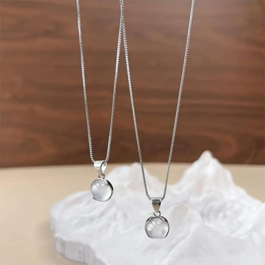 Women's oval pendant necklace with artificial crystal eight-point star on adjustable box chain