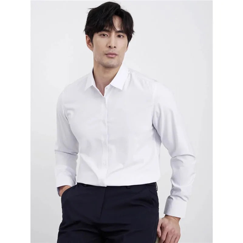 Man wearing a wine red slim fit long sleeve casual business shirt.