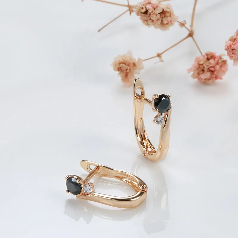 Gold women's earrings with black agate stone, geometric retro design in drop shape