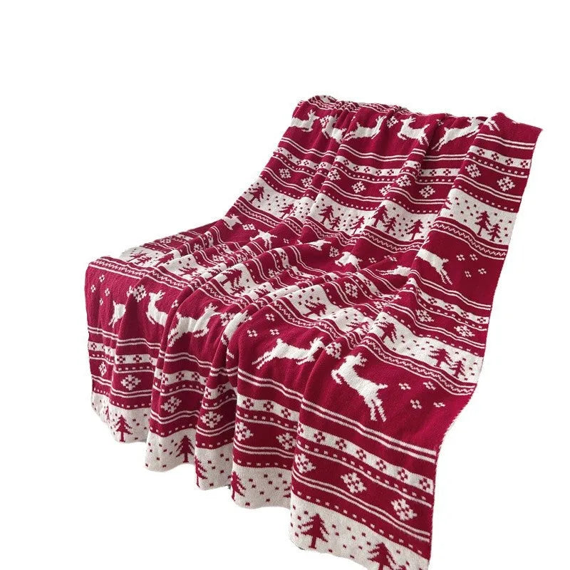Christmas blanket with reindeer or snowflake pattern in acrylic fabric