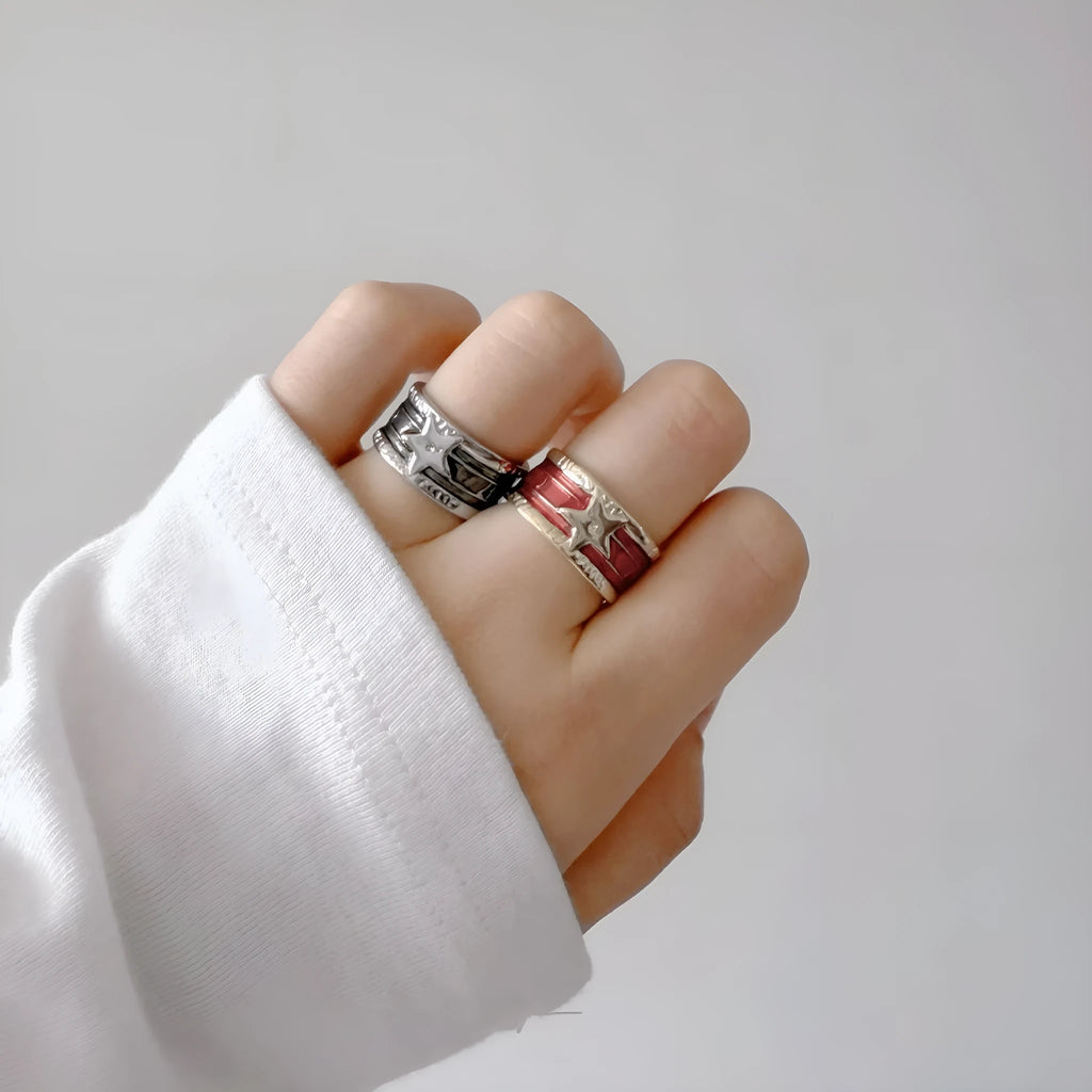 Adjustable copper geometry ring with distressed XINGX drop oil design in choice of colours.